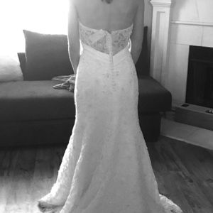 Wedding size 8 but fits like 5 Never altered